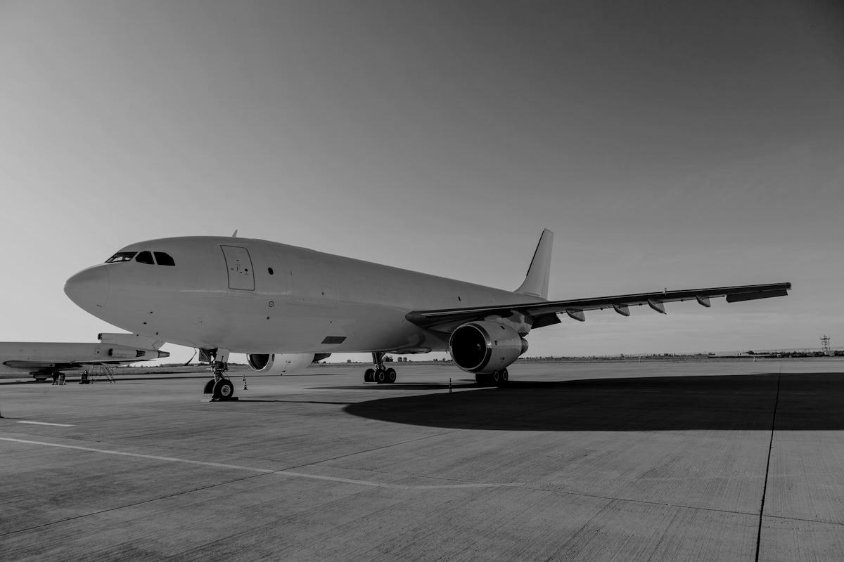 airplane-at-the-international-airport-2025-04-01-10-47-49-utc-darken