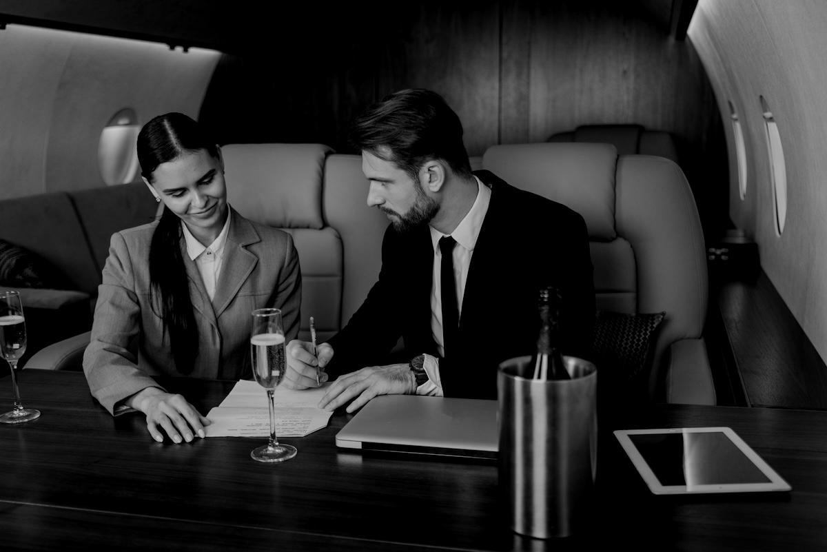 business-team-on-private-jet-2025-03-14-14-25-22-utc-darken